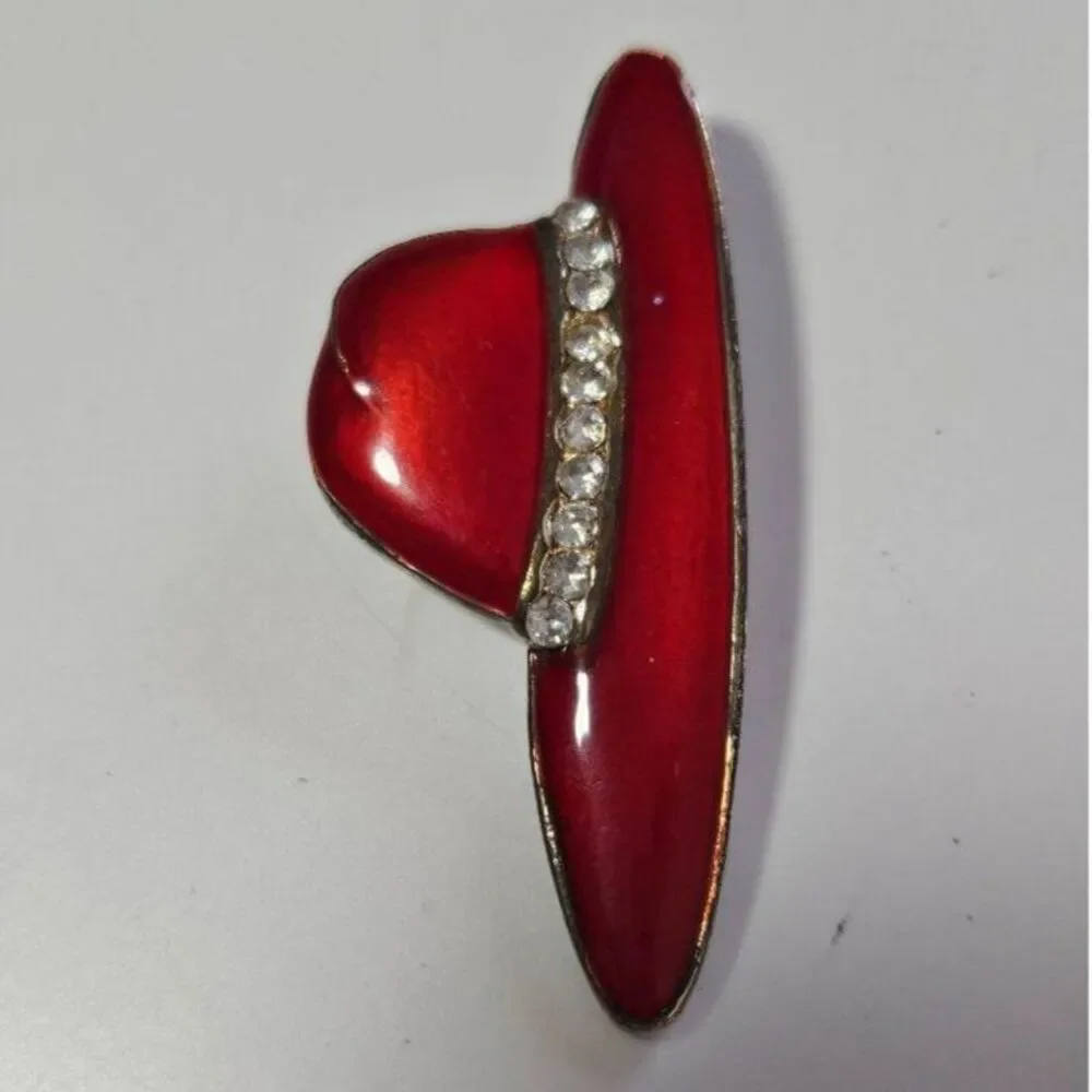Gold tone red hat society brooch